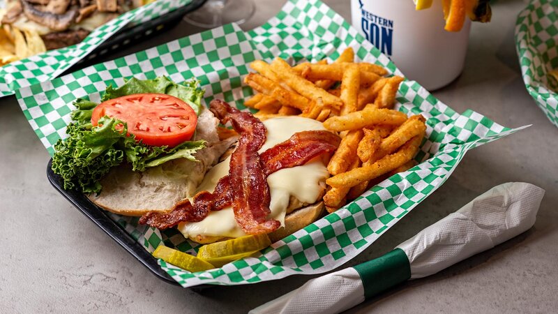 Bacon cheeseburger with side of french fries